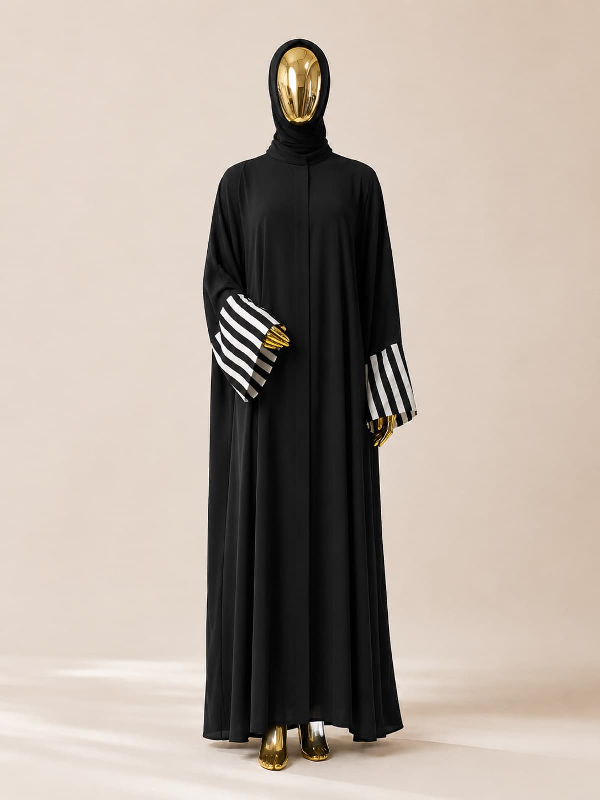 Noir Line Abaya — styled in a room setting