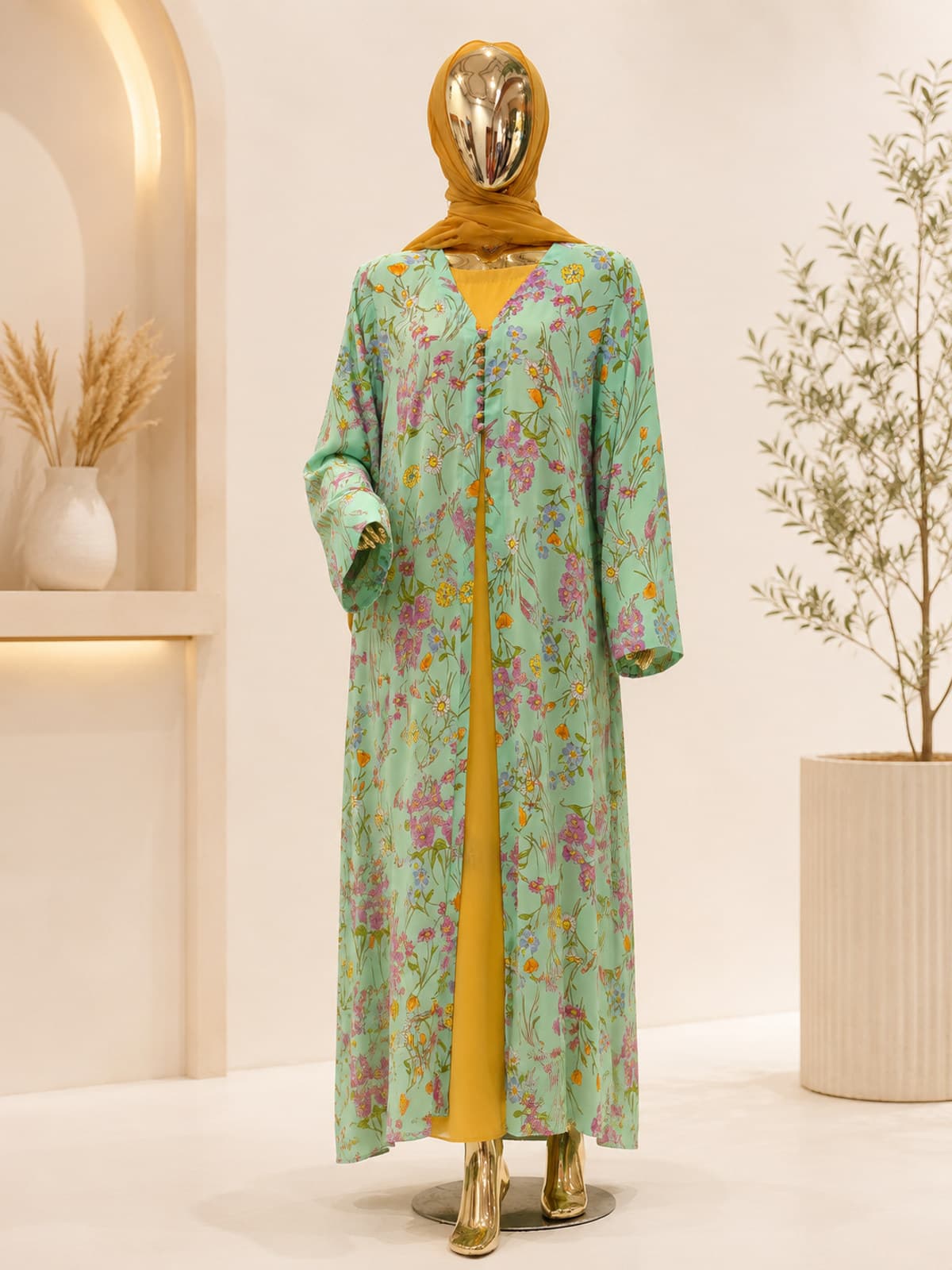 Meadow Bloom Abaya (with hijab) — styled in a room setting