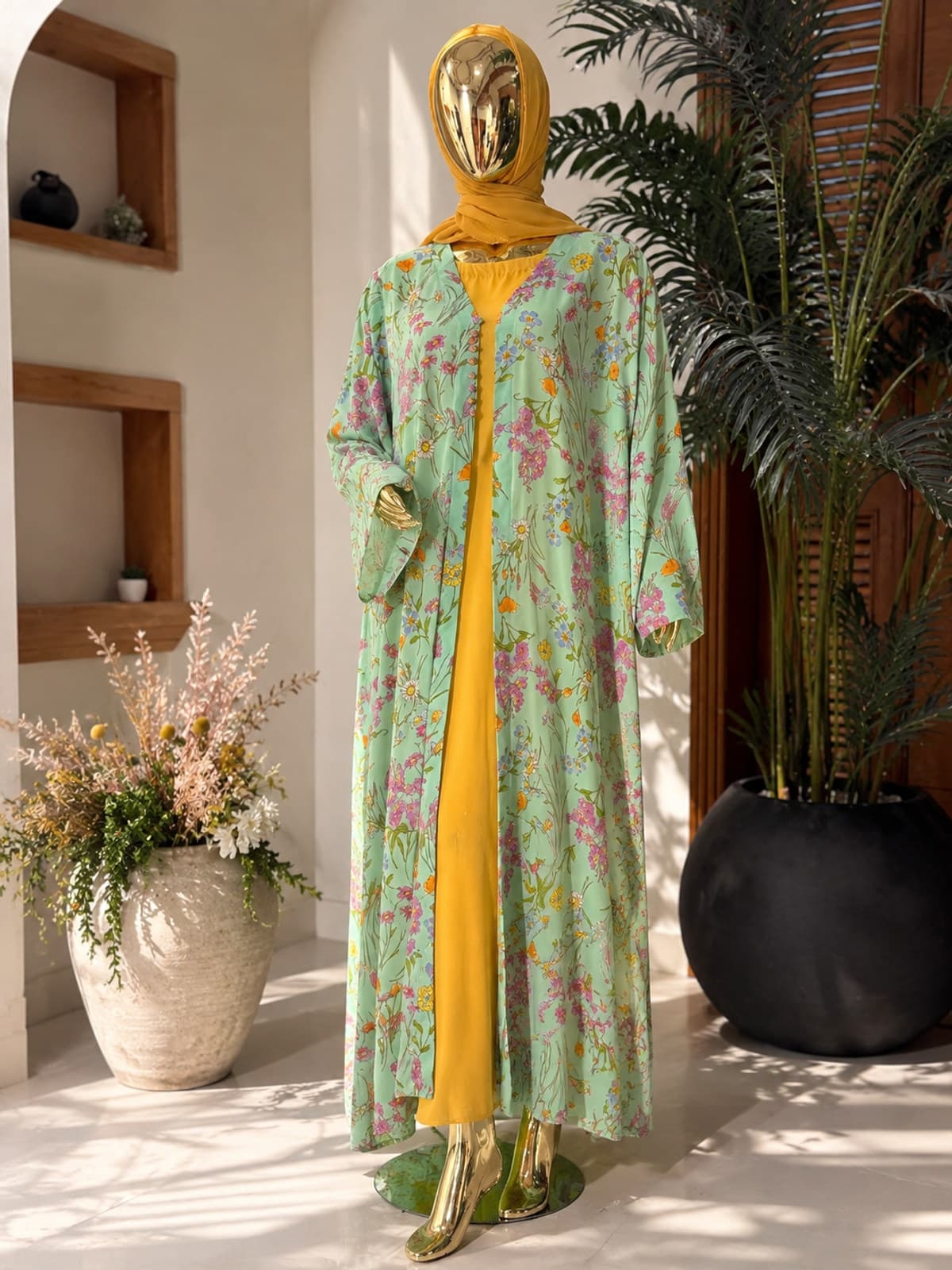 Meadow Bloom Abaya (with hijab) — styled in a room setting