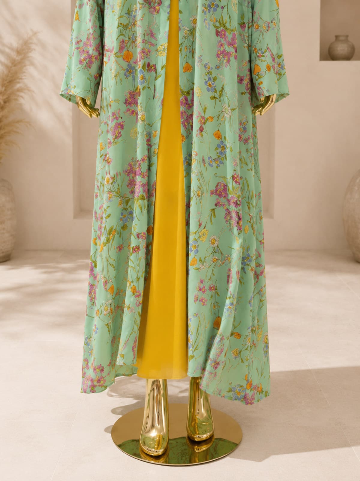 Meadow Bloom Abaya (with hijab) — styled in a room setting